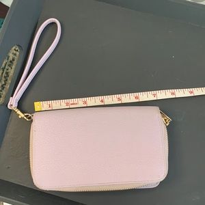 A new day wallet carry everything in this cute on the go clutch